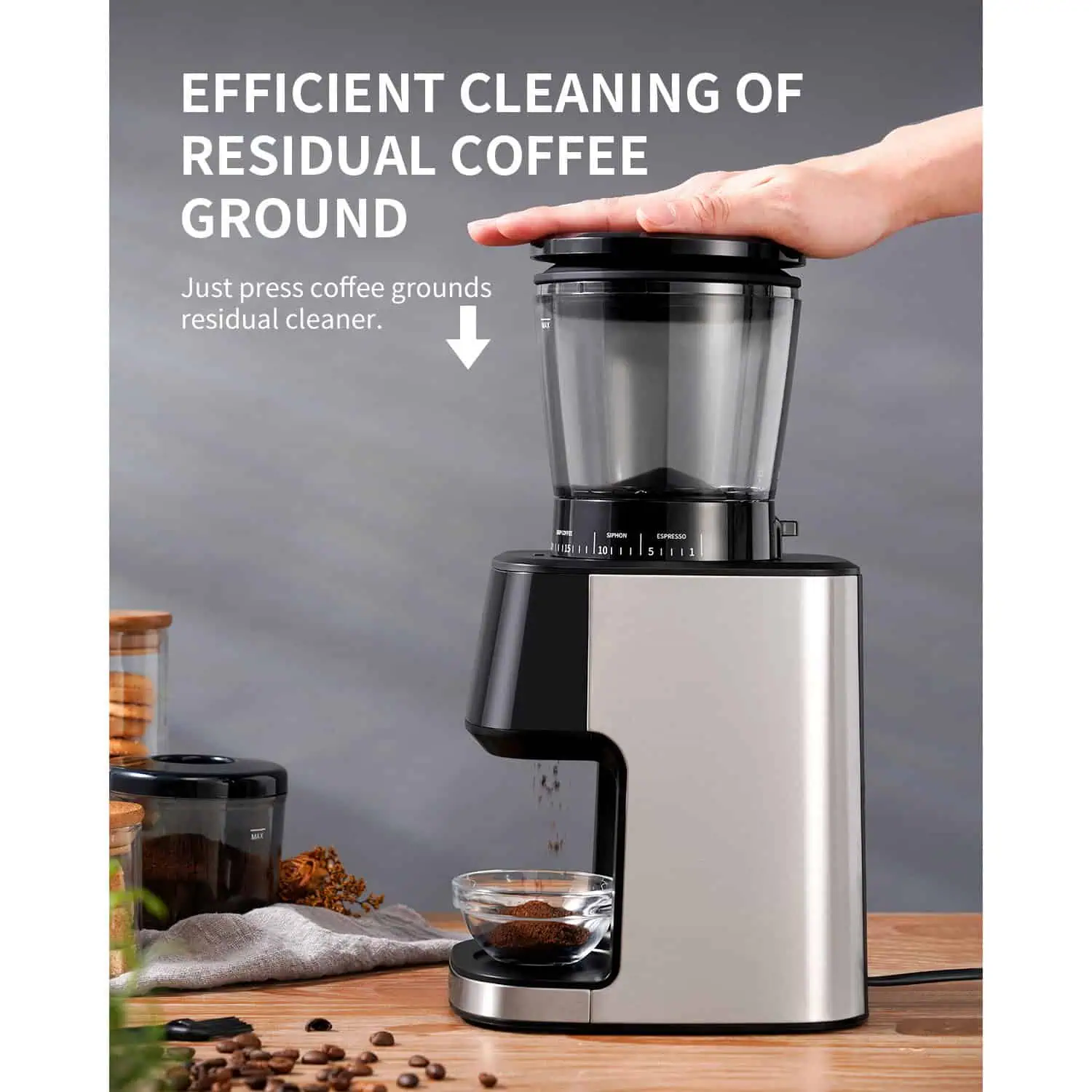 آسیاب قهوه داسلر MYLOS Pro با قابلیت تمیز کردن آسان پودر قهوه باقیمانده (Residual Cleaner) - با فشار دادن درب، قهوه‌های مانده تخلیه می‌شوند.