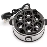 نمای بالای دستگاه تخم‌مرغ‌پز برقی نوتریکوک با سینی مشکی مخصوص قرارگیری ۷ عدد تخم‌مرغ و دو دسته جانبی.