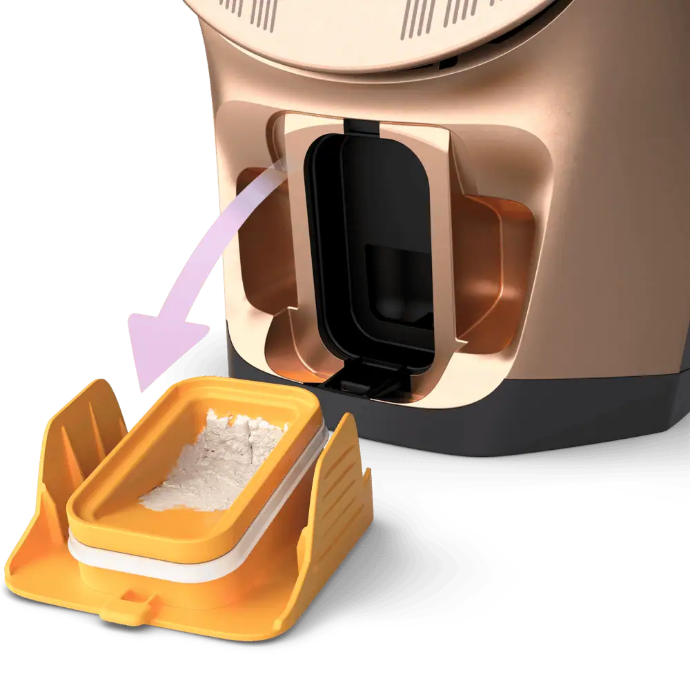 مخزن جمع‌آوری رسوب Quick Calc Release اتو فیلیپس DST8041 هنگام خارج شدن از دستگاه، همراه با رسوبات جمع‌شده.